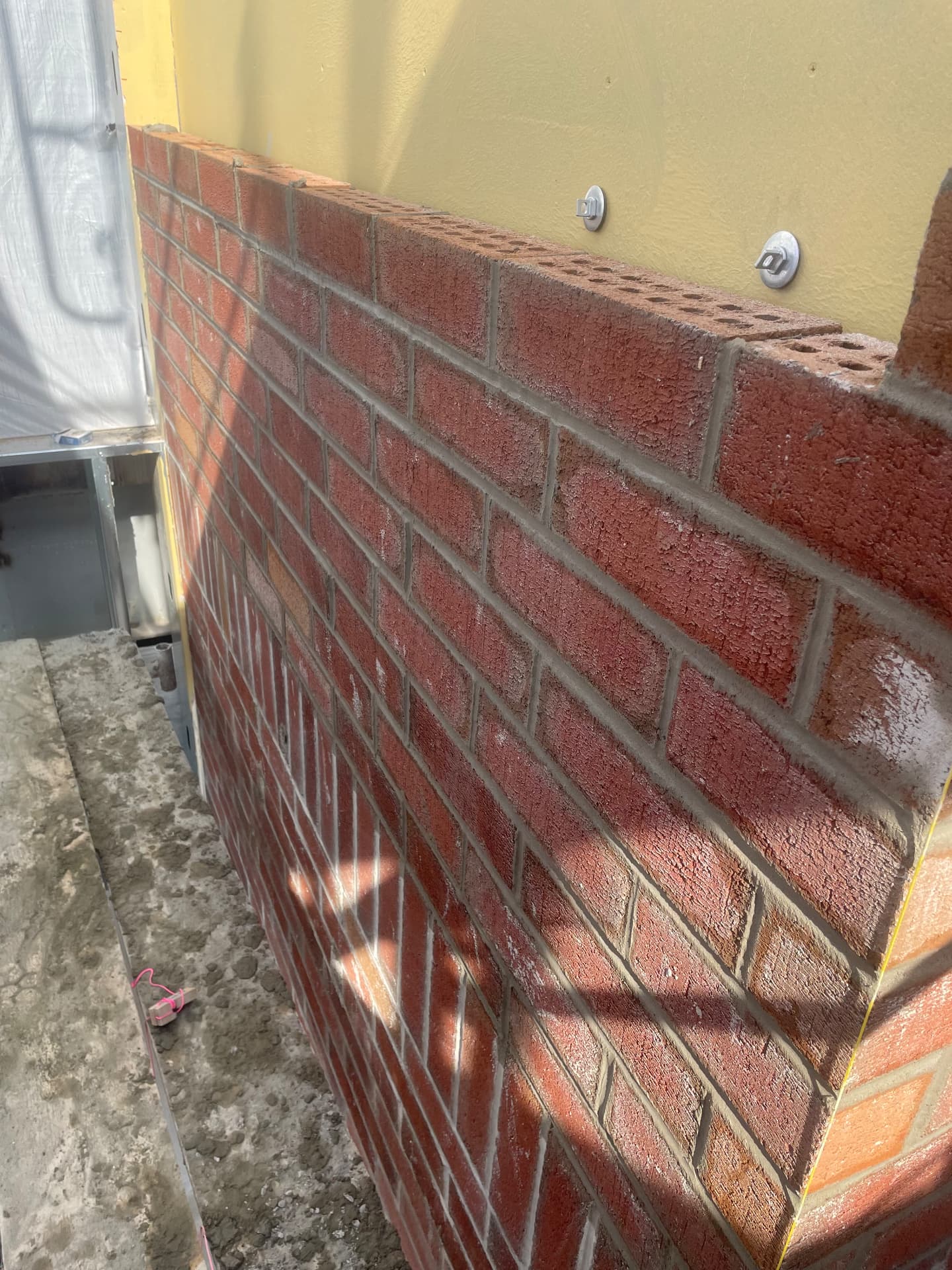 Crisp brick corner with tooled mortar joints