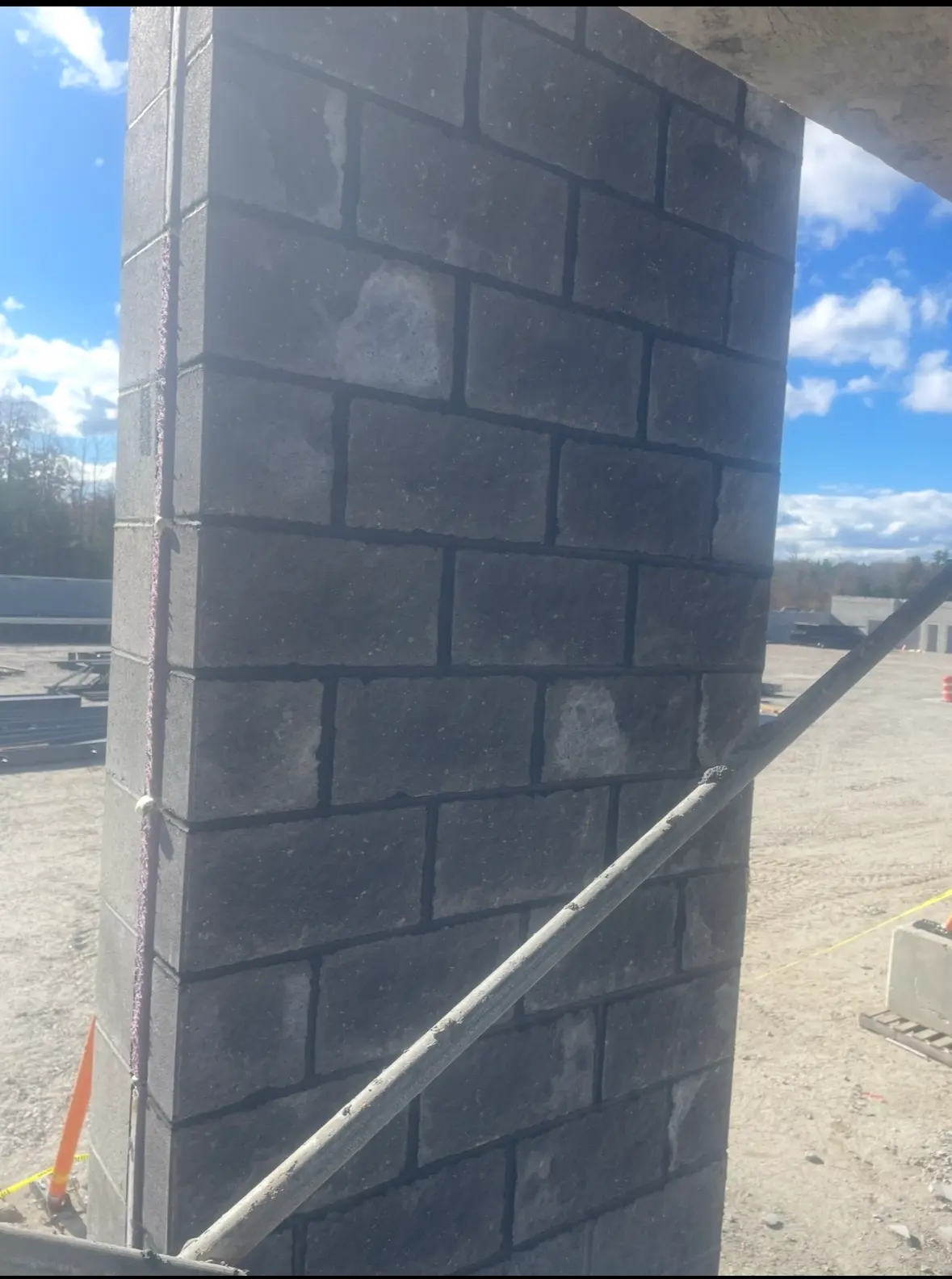 Charcoal architectural block column on a commercial build